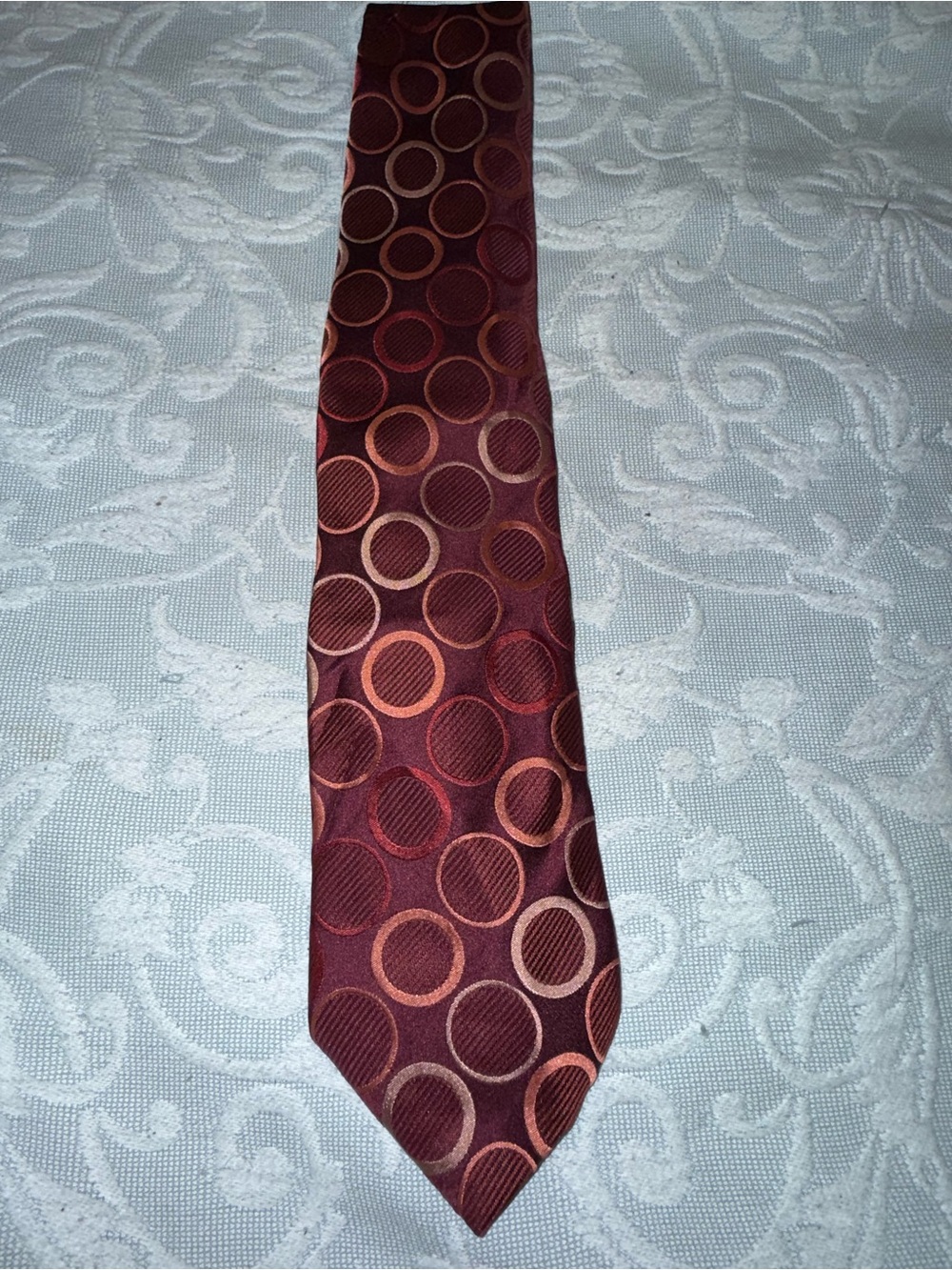 BCBG Burgundy Tie with Copper Circle Pattern